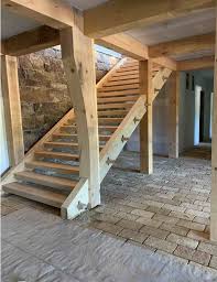 Spiral stairs are perfect for finished garages that need access to a second floor with limited space. Timber Framed Stairs Timber Staircase Timber Frame Construction Timber Stair