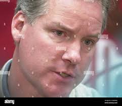 Nebraska head coach Barry Collier talks to reporters in Lincoln, Neb.,  Tuesday, Jan 15, 2002, one day before his team's game against Oklahoma.  After opening the Big 12 season against two of