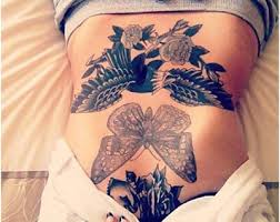 Beautiful designs and styles to help you decide on your next tattoo. Tips For Women Thinking About Getting A Stomach Tattoo Custom Tattoo Design