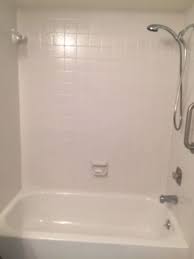 Peel the paper backing from the foam tape and position the panel over the tile. New Life To Old Bathtub Surround Tile Over Tile Yes You Can Hometalk