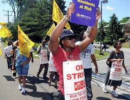 HealthBridge workers working the picket line