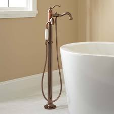 Place some plumber's putty on the washer and then slide it over the bottom of the drain body. Tub Faucet Buying Guide