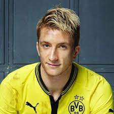 Reus's hairstyle consists primarily of an undercut or fade with a comb over, although the popular soccer player has styled a textured slick back and faux hawk in the past. Best Marco Reus Haircuts Hairstyles 2021 Update Marco Reus Haircut Soccer Hair Reus Hairstyle