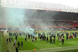 A huge crowd assembled outside old trafford hours before the match and smoke flares were set off. L11pfplixotczm