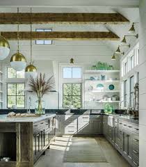 Many kitchens have just enough wall space that they need a little something but there might not be enough of course, you could also paint over it to achieve your desired look and feel if needed. This Farmhouse Kitchen Features Vaulted Ceiling Exposed Beams Shiplap Walls Shipl Farmhouse Kitchen Design Interior Design Kitchen Modern Farmhouse Kitchens