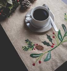 Round tables with white tablecloths, brown runners, bouquets flowers. 20 Table Runners For An Extra Elegant Christmas Dinner Storables