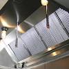 An obstruction in the vent hose/pipe/hood is preventing the moist air from exiting, this causes it to stay on the hose and puddle. 1