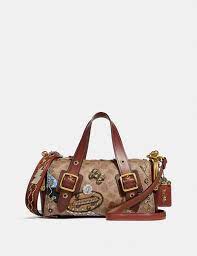 In every industry, there are too many ways to view someone else's work. Coach X Keith Haring Mailbox Bag 24 In Signature Patchwork