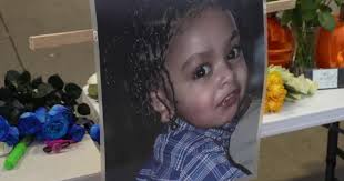 Vigil held for 2-year-old shot and killed in Lansing