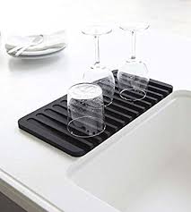 The dish drying mat is. Amazon Com Talented Kitchen Self Draining Silicone Drying Mat 15 X 8 Inches Dish And Glassware Slope Dish Drying Mat Sink Drainer Functional Kitchen Storage