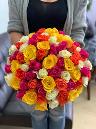 Elegant flower design in light pink colors. 100 Mixed Roses Bouquet By Luxury Flowers Miami