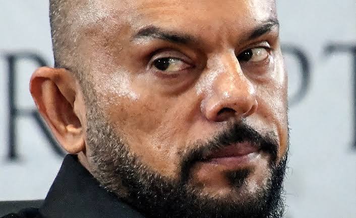 Sick' businessman Carrim, who may've been out shopping, now says his movements are private