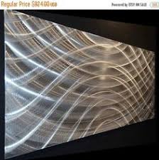 Steel sculptures, yard torches, birdfeeders, and luminaries in botanical shapes. 11 Brushed Aluminum Art Ideas Aluminium Art Brushed Aluminum Art