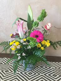Sign up to receive text alerts about your trip. Cushion Silver Bucket Arrangement In Orlando Fl Progress Flowers