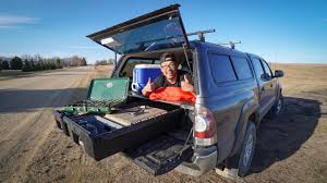 Camping in the back of a truck. My New Truck Camping Setup Bed And Drawer Installation Youtube
