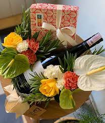 Order one of your favourite flower and chocolate hampers from gifola and send it to your dear ones with lots of love and best wishes. Wine And Chocolates In A Basket Flower Shop In Bali Best Delivery In Bali The Bali Florist