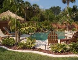 Tropical Landscape By Globus Builder Backyard Pool Landscaping Tropical Pool Landscaping Pool Landscape Design