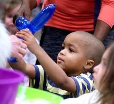 Children get to meet. Santa and Mrs. Claus during Storytime at the Library