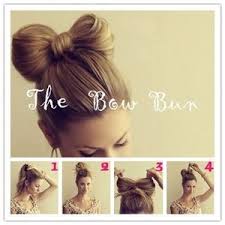Hold hair in the wrapped position until it's warm, then unwind it, creating a tight curl. Hair For Picture Day And A Outfit Hair Bow Bun Hair Styles Long Hair Styles