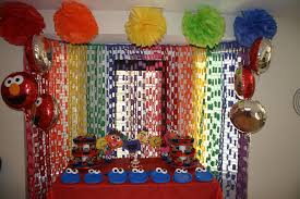 Diy First Birthday Decoration At Home Home Made Decorations For An Elmo Sesame Street Themed Birthday Party Inspired By Other Ideas From Elmo Birthday Party Sesame Street Birthday Party Elmo Party