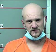 Violent,' armed suspect surrenders after standoff in Caneyville