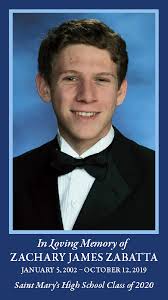 Today our St. Mary's High School Family gathered to lay our brother, Zach,  to rest. Eternal rest grant unto him, O Lord, and let perpetual light shine  upon him. May his soul,