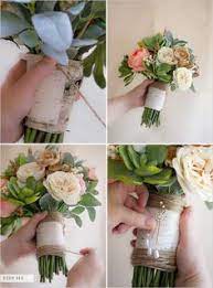 I think you'd be surprised how great fake flowers can look when assembled as a wedding bouquet. 11 Fake Wedding Flowers Ideas Wedding Flowers Wedding Wedding Bouquets