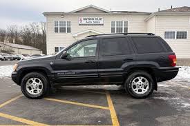 Image result for Brilliant Black 2004 Jeep