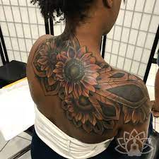 Dark Skin Tattoos Sunflowers Tattoo Dark Skin Body Art Tattoo Ideas And Inspiration Dark Skin Tattoo Black Girls With Tattoos Body Art Tattoos
