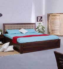 I am a very handy person and even have my own wood shop. Buy Solid Wood King Size Bed With Quilted Upholstered Headboard With Storage In Light Walnut Finish By Asian Arts Online Contemporary King Size Beds Beds Furniture Pepperfry Product
