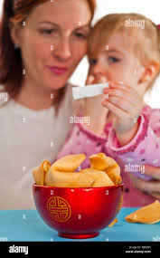 Fortune cookie and child hi-res stock photography and images