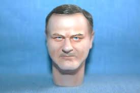 Minifigure head with side-looking eyes and hollow stud