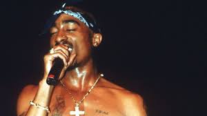 A Look At Tupac Shakur S Rule Breaking Style On And Off The Stage In 2020 Tupac Shakur Tupac Rock And Roll