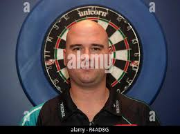 World Champion Rob Cross during a photocall for the 2018/2019 William Hill  World Darts Championship, outside the Tower Guoman Hotel, London Stock  Photo