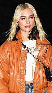 Dua lipa the pop singer traded in her blonde and black locks for a new hue: Dua Lipa Debuts Red Hair In Stunning Beauty Makeover Photos Hollywood Life