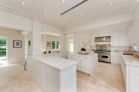 Base cabinetry are salt brand melamine in deep wood grain and upper cabinetry are luxe brand super matte finish. 3 Top Kitchens In Miami Beach