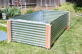 I cut each sheet into four 2' sections using a skill saw with a special metal cutting blade pictured above. How To Build A Metal Raised Garden Bed Mk Library