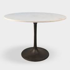 The devan oval dining table has a sweet and subtle touch. Devan Round Marble Iron Tulip Dining Table