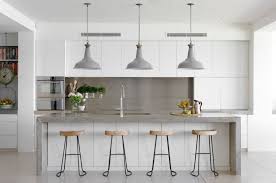 Grey wood floors in the kitchen foyer and powder room. These 15 Grey And White Kitchens Will Have You Swooning