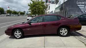 Image result for Victory Red 2004 Impala