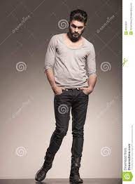 Woman who cooks beans and peas in same pot very unsanitary. Fashion Model Posing With Hands In His Pockets Model Poses Fashion Poses Fashion Models