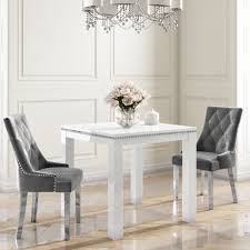 Wooden table over blurred kitchen scene. Jewel Square White High Gloss Dining Table With 2 Silver Grey Velvet Dining Chairs Furniture123