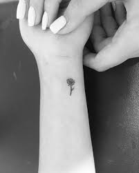 31 Remarkably Lovely Small Tattoo Designs For Women Tattoo Designs For Women Small Tattoos Foot Tattoos For Women
