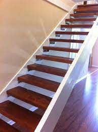 Before After Andrea Cliff S Updated Floating Stairs Stairs Diy Renovation Diy Stairs Floating Stairs