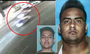 Dozens of vehicles are seen driving past hit-and-run victim who was left  lying in the middle of road