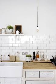 White Kitchen Subway Tiles And Rustic Wooden Surface Winter Whites Rustic Kitchen Kitchen Interior Chic Kitchen