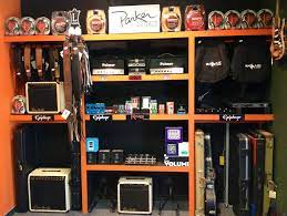 New Accessories In Stock Whole Wall Filled Amps Straps Headphones Guitarbag Guitarcase Amplifier Pedals Effects Guitar Bag Guitar Case Amplifier