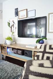 How To Decorate Around The Tv Dodesignyourself Living Room Tv Stand Tv Decor Mounted Tv Decor
