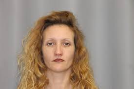 Sterling woman accused of forgery turns herself into police