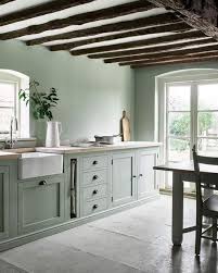 Beautiful Rustic Modern Kitchen With Rough Hewn Wood Beams And Green Cabinetry Regram Via Stiltje Se Bondgardskok Hem Inredning Koksdesign